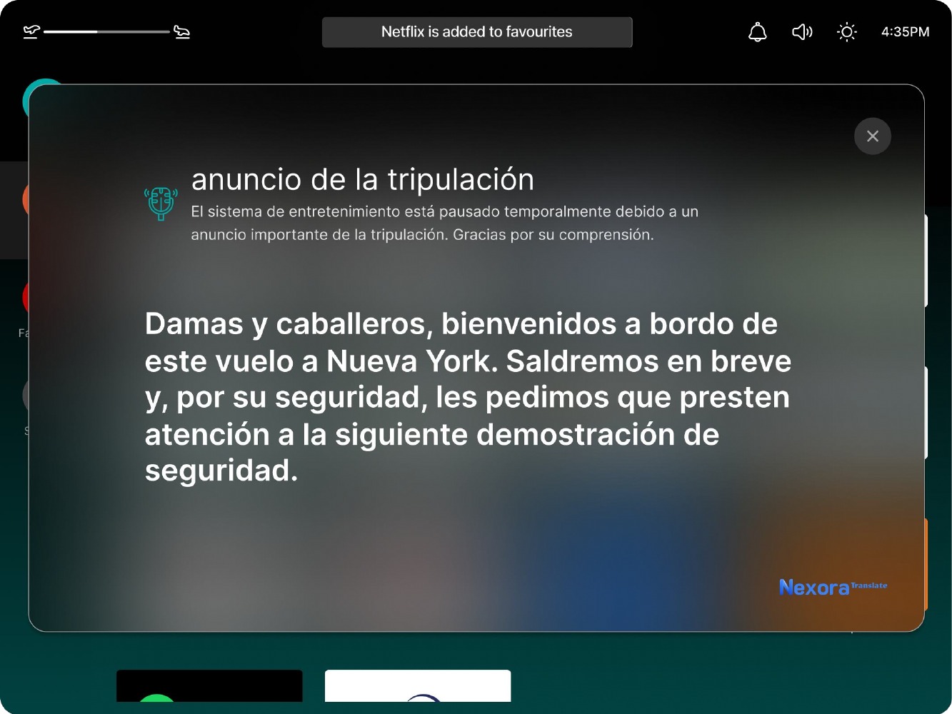 Passenger screen showing a live crew announcement translated into Spanish as readable text